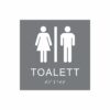 Grå och vit toalett­skylt med piktogram av en kvinna och en man separerade av ett vertikalt streck, texten toalett står under symbolerna och punktskrift längst ned