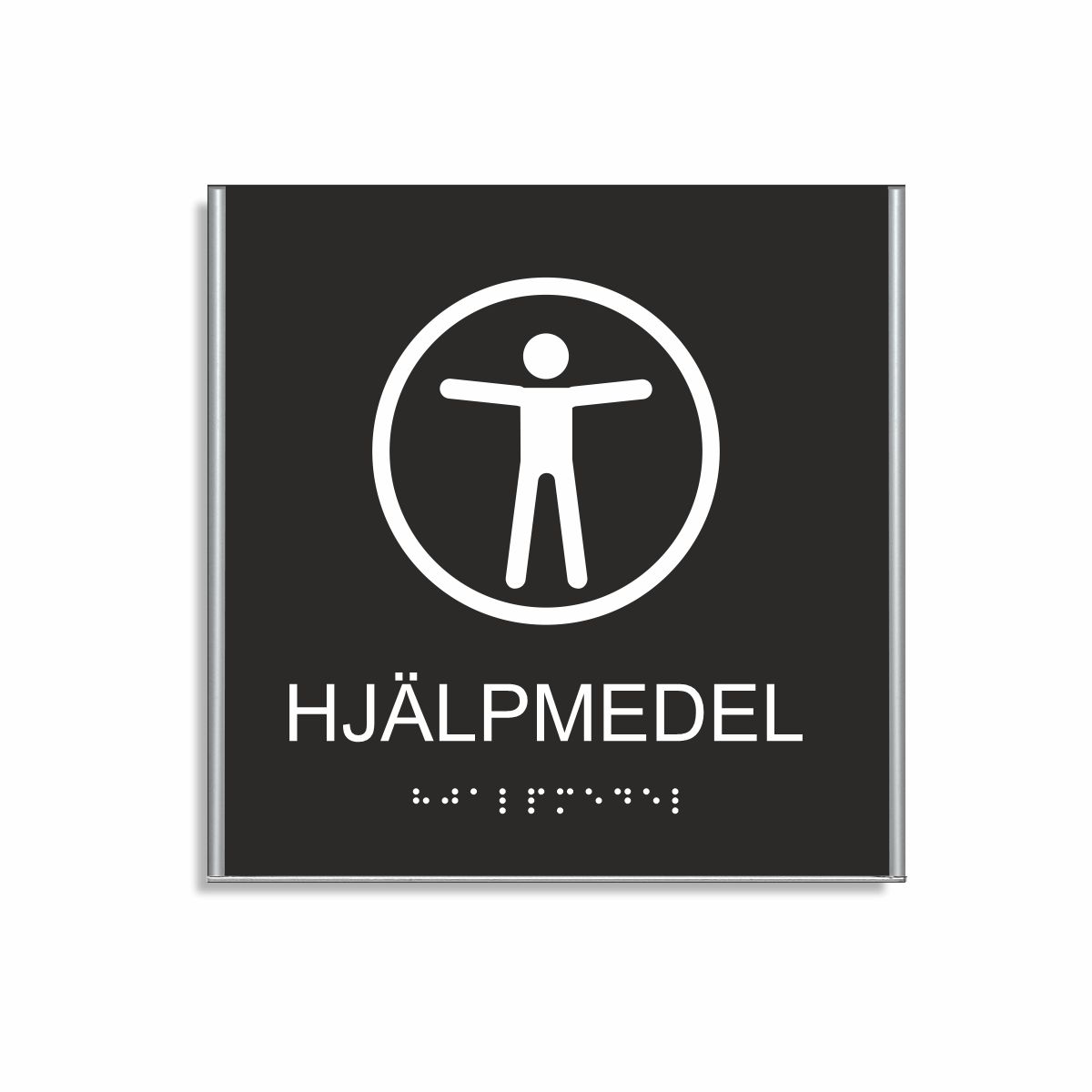 Svart och vit skylt för hjälpmedel i storlek 150 x 150 mm med en tunn aluminiumram, med piktogram av en människa med utsträckta armar inuti en cirkel, texten hjälpmedel står under symbolen och punktskrift längst ned
