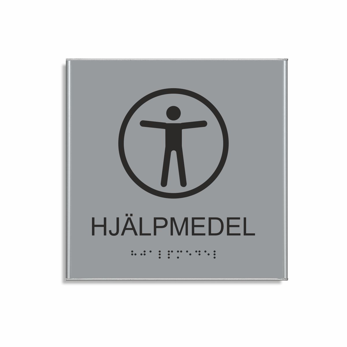 Silvergrå och svart skylt för hjälpmedel i storlek 150 x 150 mm med en tunn aluminiumram, med piktogram av en människa med utsträckta armar inuti en cirkel, texten hjälpmedel står under symbolen och punktskrift längst ned
